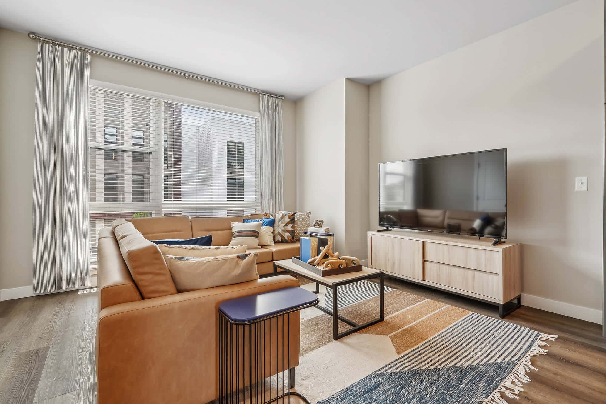 living area with sofa and television